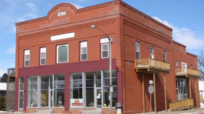 Newly renovated by West CAP, this historic building on Main Street in Boyceville serves as the nonprofit's regional food pantry and has four energy-efficient apartments on the second level. 