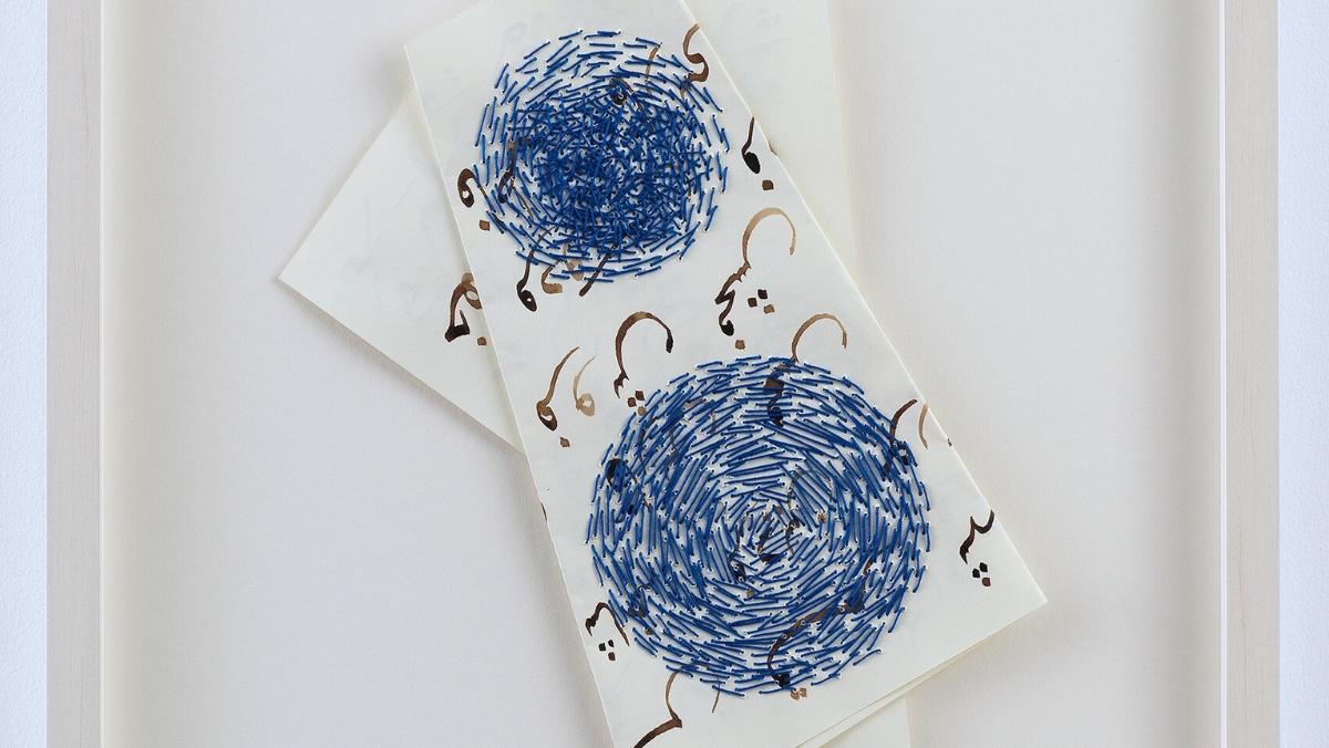 Image detail of artwork, calligraphy and embroidery on paper