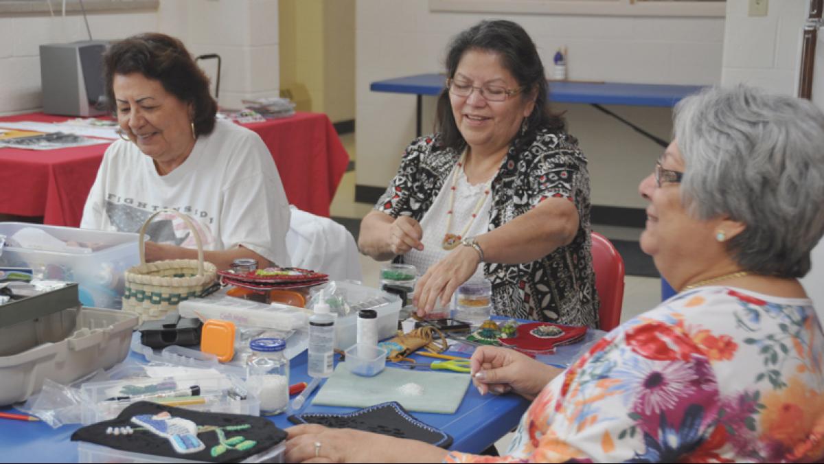 A beading workshop at the Oneida Nation Arts Program.  Pictured, left to right: Sandra Wescott Gauthier, Judith L. Jourdan, Betty Willems.