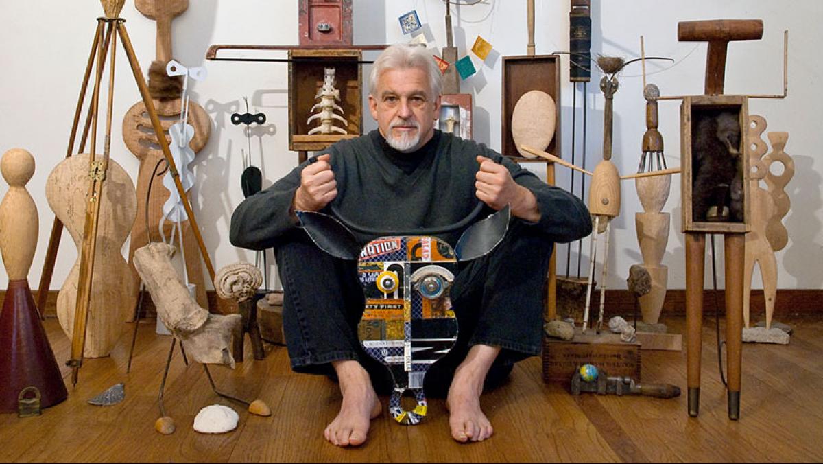 David McLimans poses with some of his artwork. Photograph by Joseph Blough. Copyright © 2010 by JB Patrick Flynn.