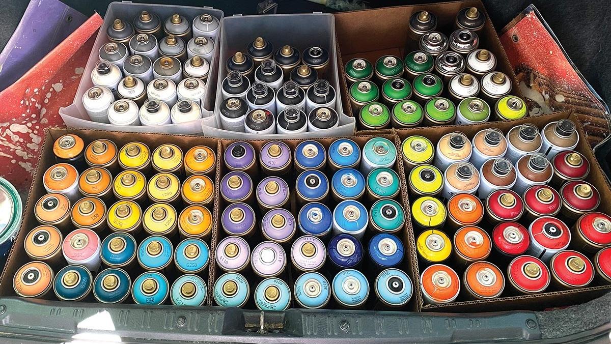 Spray paint cans in car trunk