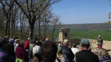 Stanley A. Temple addresses the audience at the May 17, 2014, rededication of the Passenger Pigeon Monument at Wyalusing State Park. Temple, who led the effort to restore the 67-year old monument, has traveled the U.S. this year on a speaking tour in observance of the centenary of the extinction of the species. 